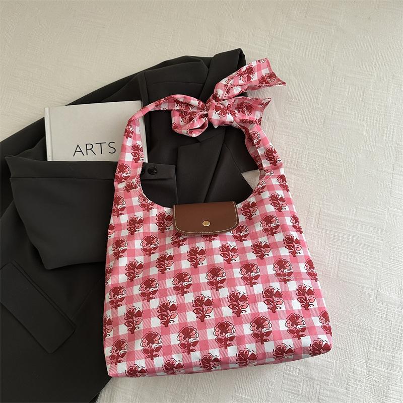 

2025 spring and summer new casual versatile cute floral knotted shoulder underarm bag women s bag big personality trendy fashion