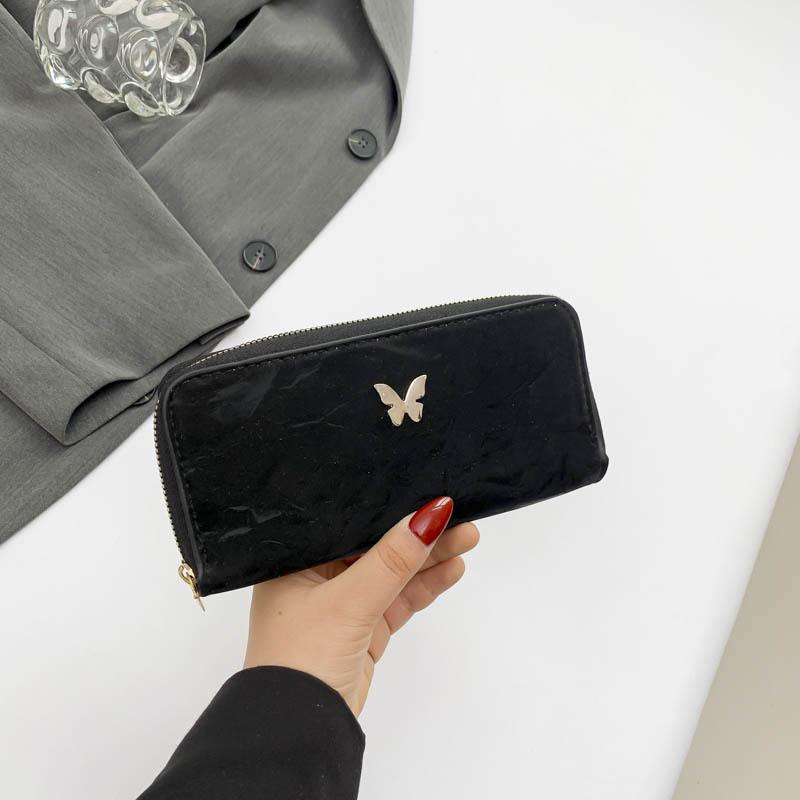 

Мода и иностранный стиль, простая и красивая однотонная сумка-клатч 2024 года, новый персонализированный летний клатч, повседневный темпераментный женский кошелек чёрный