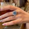Zhuozhifan Jewelry S925 Sterling Silver Aquamarine Heart & Ice Flower Ring for Women