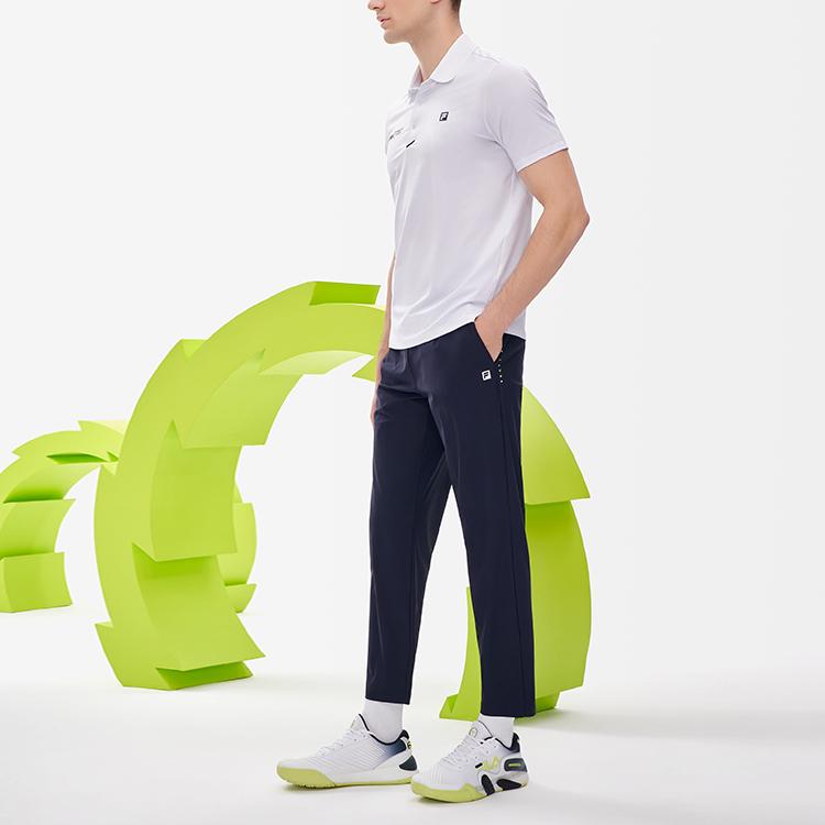 Fila Atletismo Casual Fitness Corrida Respirável Cor Sólida Tricotado Esportivo Calças Compridas Masculinas bottoms Azul-Escuro A11M233601FNV