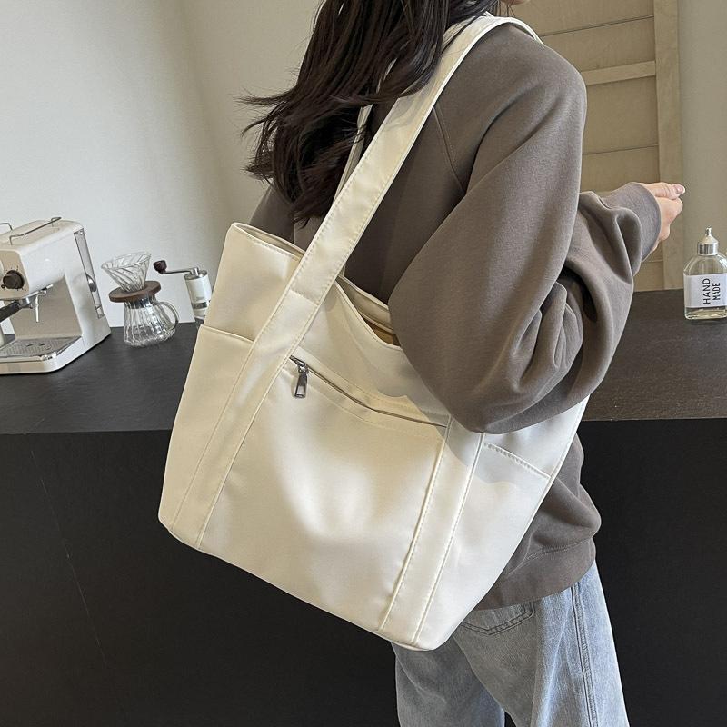 Simple commuter leisure large-capacity tote canvas bag high-value literary college student class women's shoulder bag bag