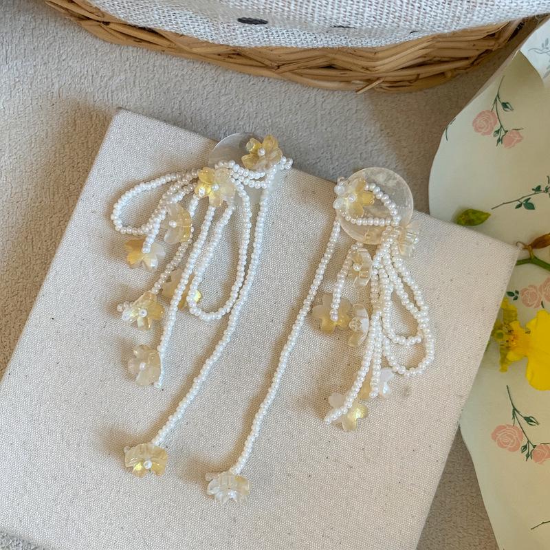 2026 New Spring Dream Orchid Tassel Earrings – Resort Style, Sweet Floral Design, Versatile High-End Studs for Women.