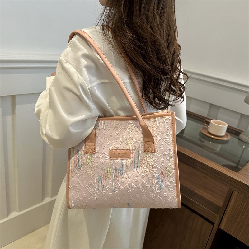 Stylish portable shoulder bag, commuting beautiful large-capacity canvas bag, simple 2025 new women's bag, foreign style tote bag
