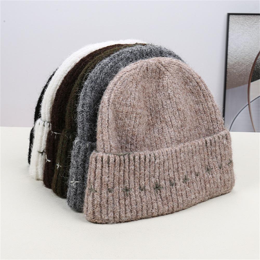Autumn and winter simple small line knitted hat women's autumn and winter warm wool hat showing face small cold hat men and women