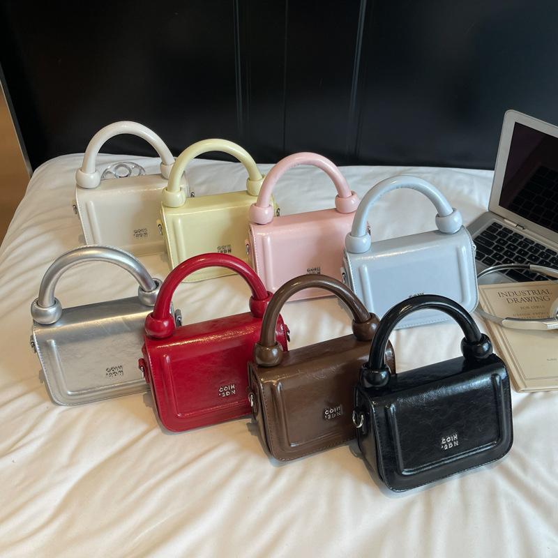 Simple high-end portable small square bag 2025 summer new niche trend fashion casual versatile shoulder women's bag