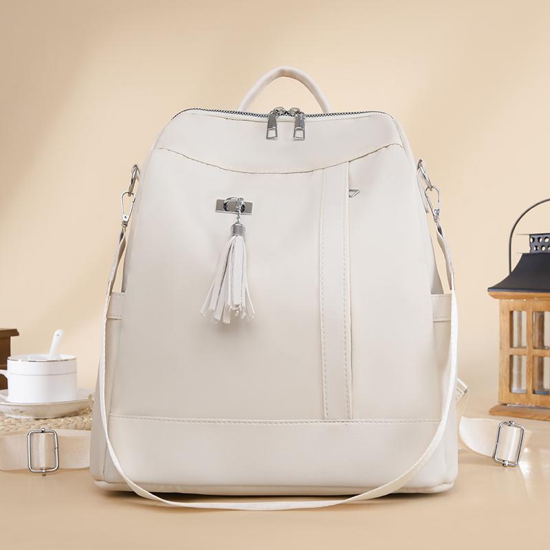 Neue Große Kapazität Einfachen Stil Casual Mochila Reise Frauen Design Quaste Rucksack Wasserdichte Stoff Große Weibliche Schulter Tasche