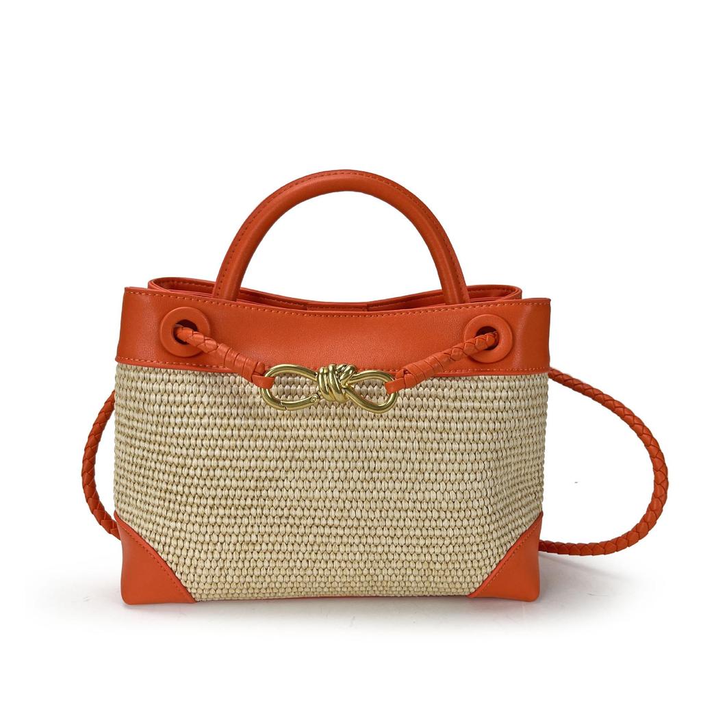 2026 New Eight Character Metal Bow Leather Splicing Lafite Grass Handmade Straw Single Shoulder Crossarm Handbag