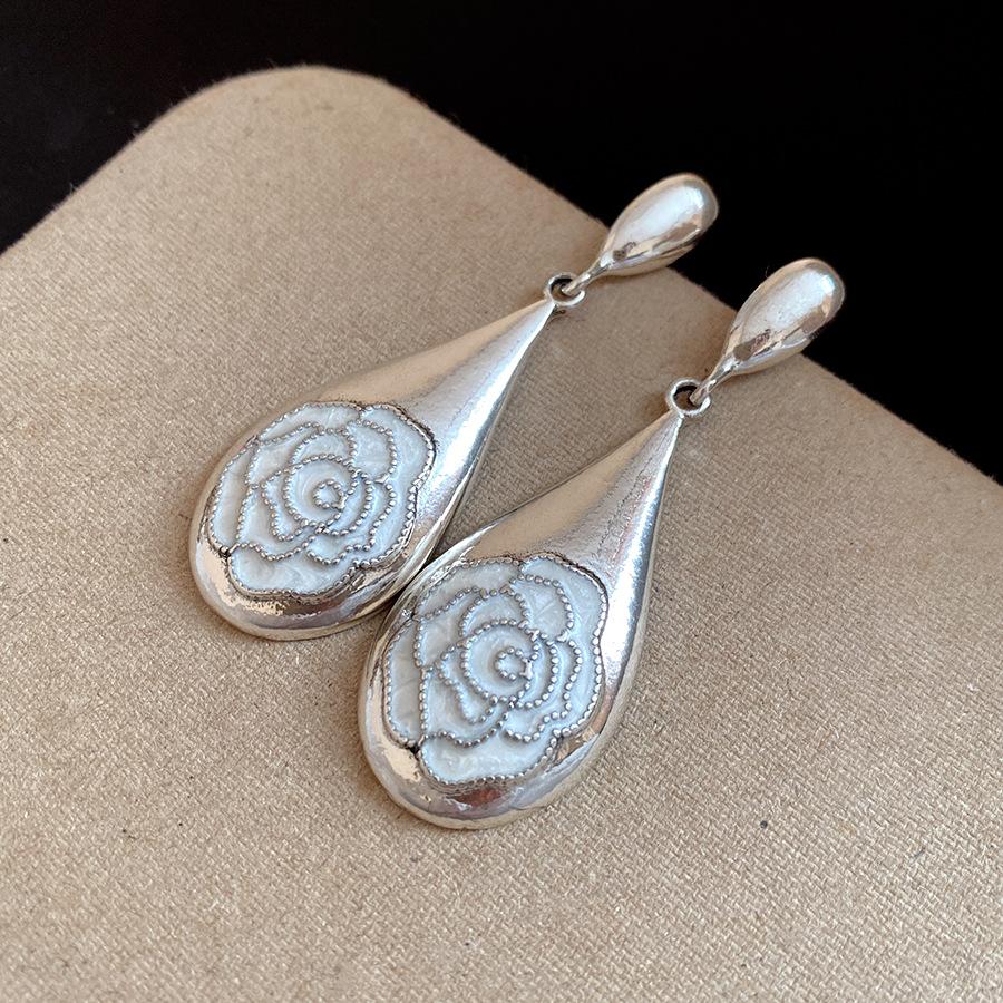

Silver Needle Dripping Oil Flower Water Drop Pendant Earrings Personality Simple Fashion Temperament Earrings Light Luxury Advanced Earrings Women
