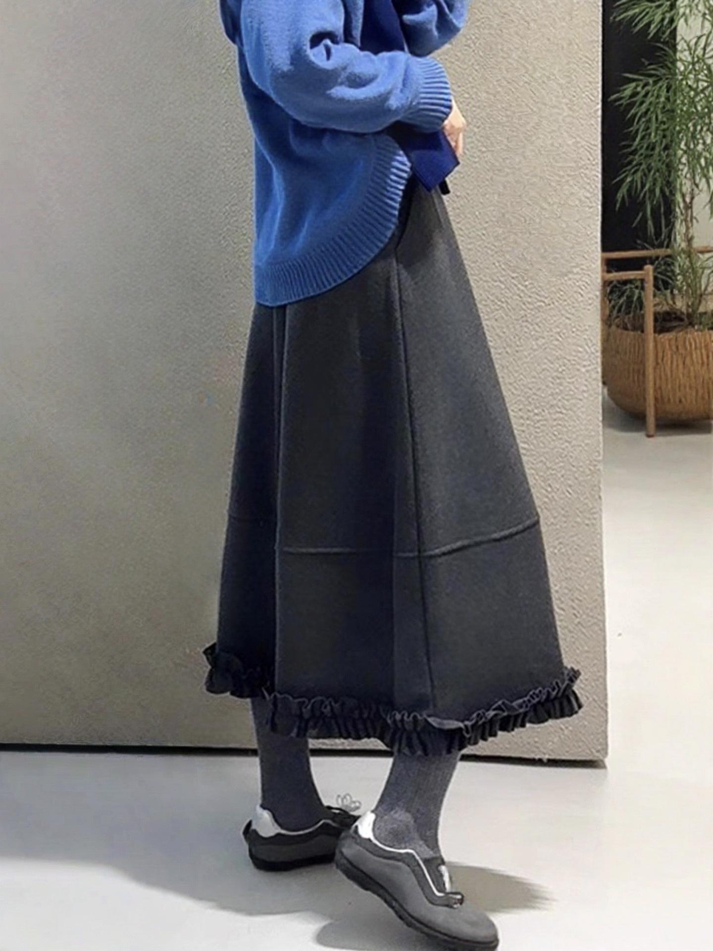 

Women s Woolen A-Line Midi Skirt with Sweet Flounce, High Waist, and Large Hem - Autumn/Winter 2025 Style. Large сірий колір