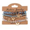Handmade Bohemian Butterfly Layered Bracelet Set: 4-Piece Beaded Crystal Rhinestone Design
