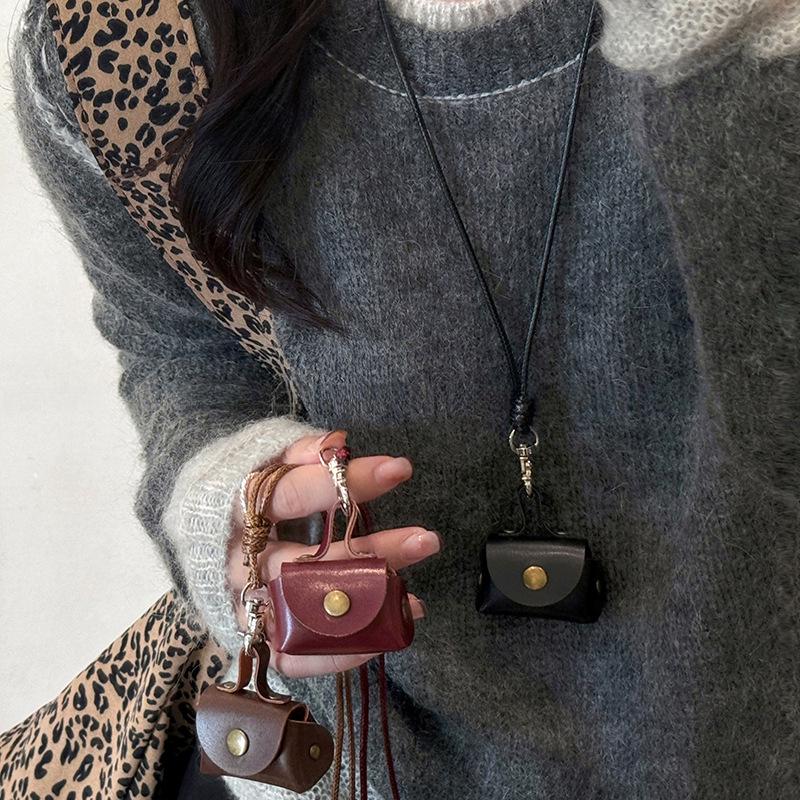 Retro Leather Coin & Earphone Pouch Necklace - Versatile Commuting Sweater Chain, High-End Jewelry.