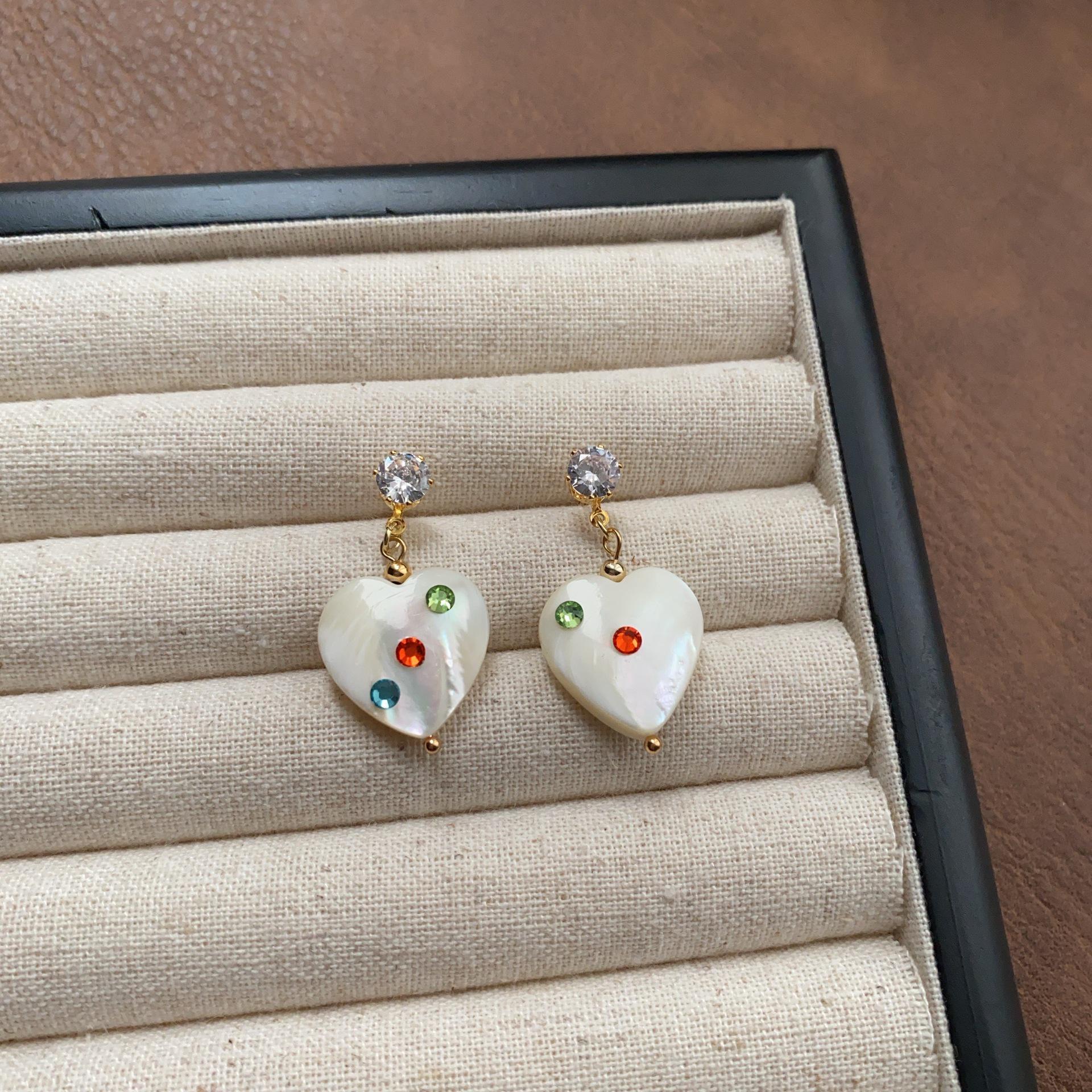 

Romantic Heart Stud Earrings with Natural Shell Texture - Energetic & Eye-catching Design