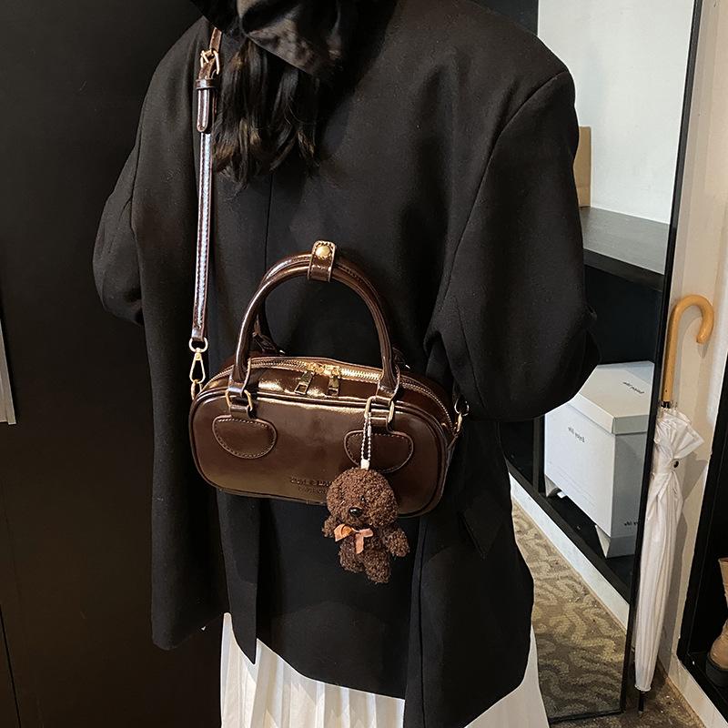 Tragbare Bowlingtasche Damen 2025 neue trendige Mode einfache Kissen-Tasche einzelne Schulter Umhängetasche trendy