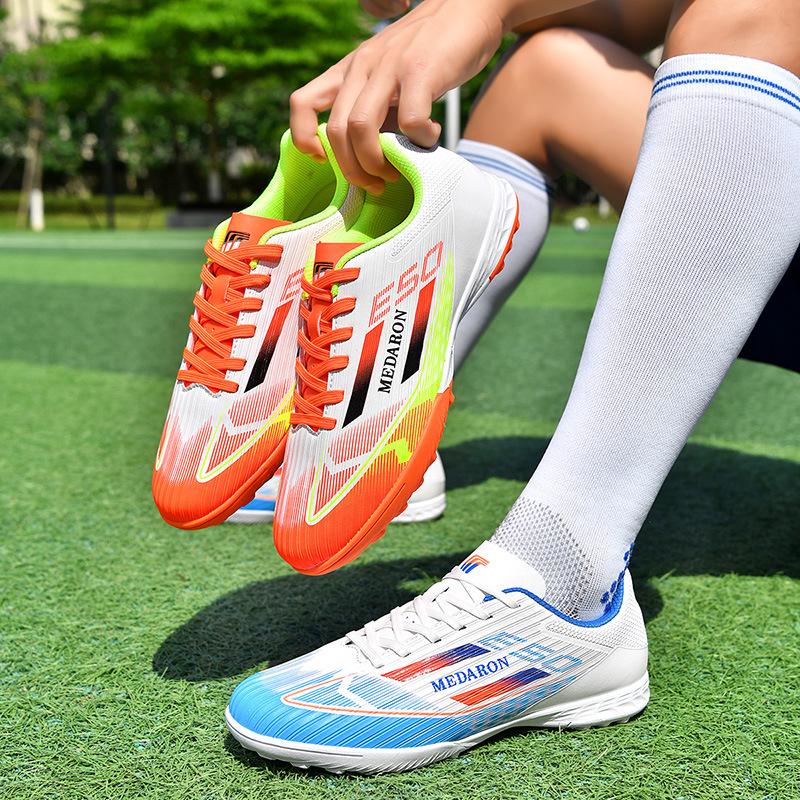 New colorful football shoes with long broken nails and breathable sports training shoes