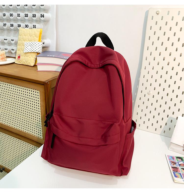 School bag new fashion solid color large capacity school bag Korean version ins versatile simple backpack casual spring outing light backpack