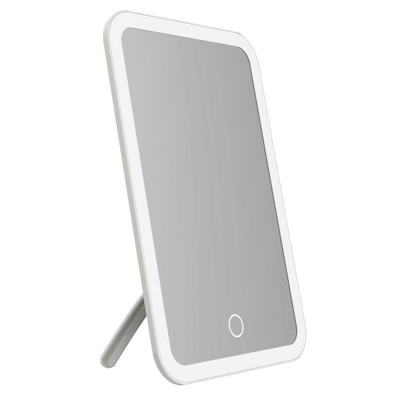 Peach LED Makeup Mirror with Intelligent Touch Dimming, HD Lighting, and Rechargeable Function.