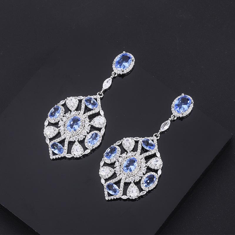 

S925 Серебряная игла Популярные имитационные ювелирные аксессуары Hongbao Танзанийские синие серьги Модные женские