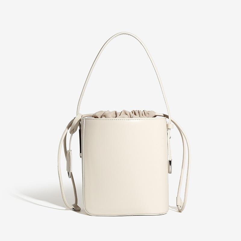 2024 Summer New Niche High-End Handheld Bucket Bag for Women, Unique Irregular Single-Shoulder Crossbody Drawstring Bag