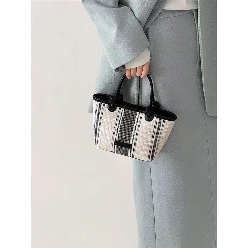 

Retro striped bucket bag women s 2025 new high-end texture fashion commuter shoulder crossbody portable tote bag