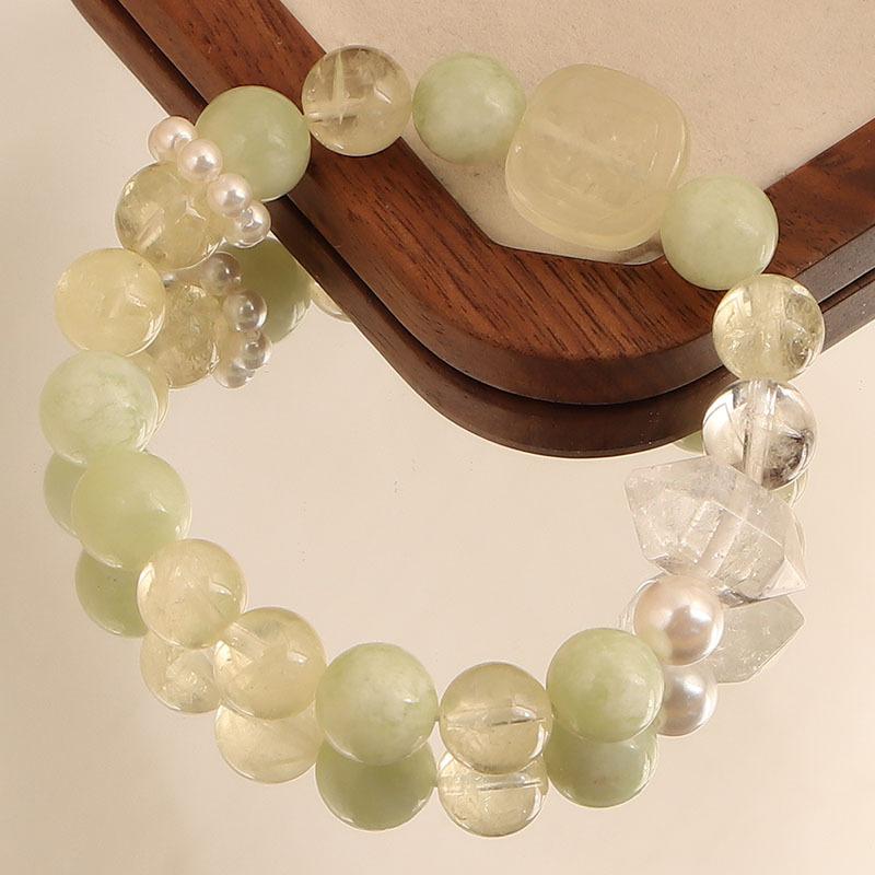 

Natural jade Xiuyu round bead lemon crystal single circle pearl bracelet double pointed white crystal bracelet.