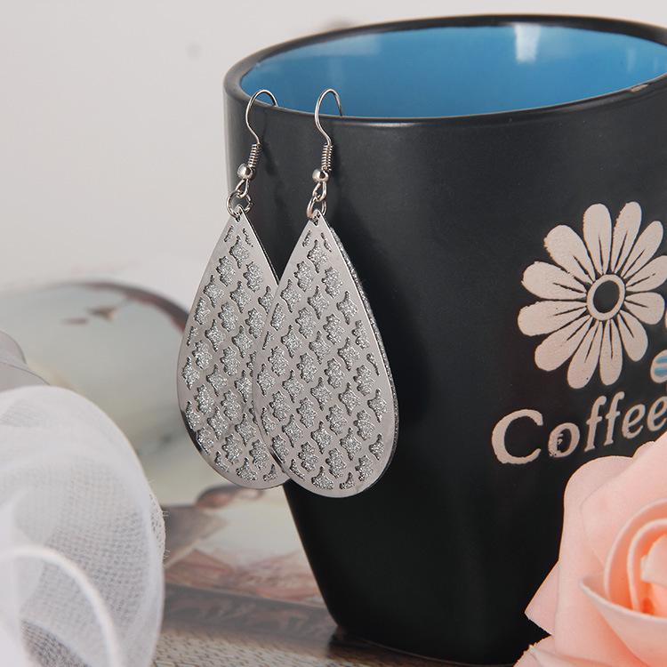 Frosted Geometric Leaf Tassel Earrings - Creative Hollow Round Design