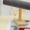 Mylove Women's Silver Stainless Steel Tassel Necklace with Butterfly Knot and Zircon Trendy Link Chain for Gift