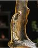 Zen Guanyin Buddha Statue with Golden Cicada Lamp and Flowing Water Fish Tank for Home Entrances.
