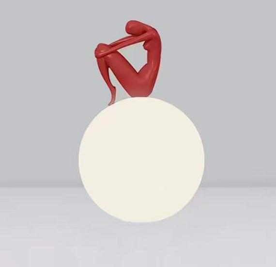 Modern Nordic Table Lamp Sculpture: Creative Doll Holding Luminous Ball for Bedroom and Living Room Decor