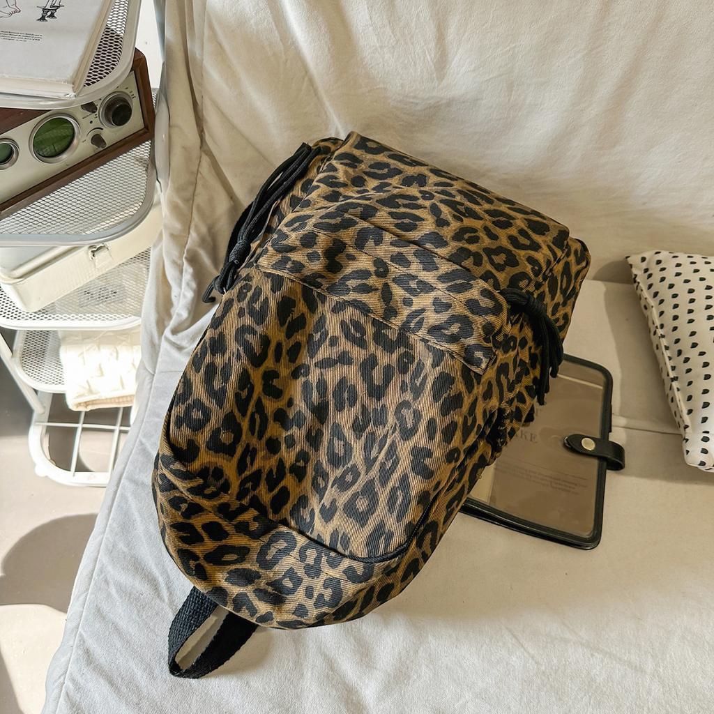 Leopard Print Backpack Casual Daily Use Trendy Street Style Lightweight Backpack for Women with Tassel Detail for School Travel and Everyday Outings