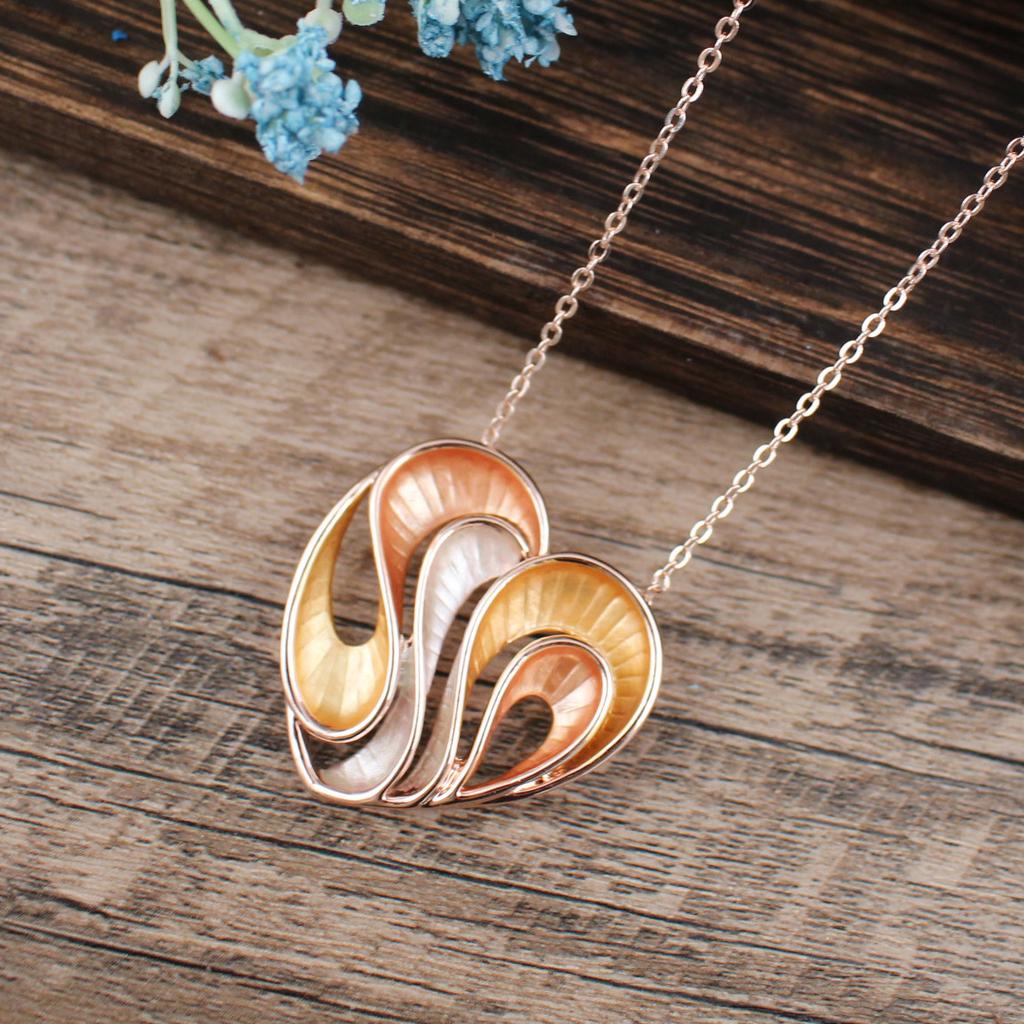 New color coated hollow love pendant, small fresh women's simple geometric line heart necklace