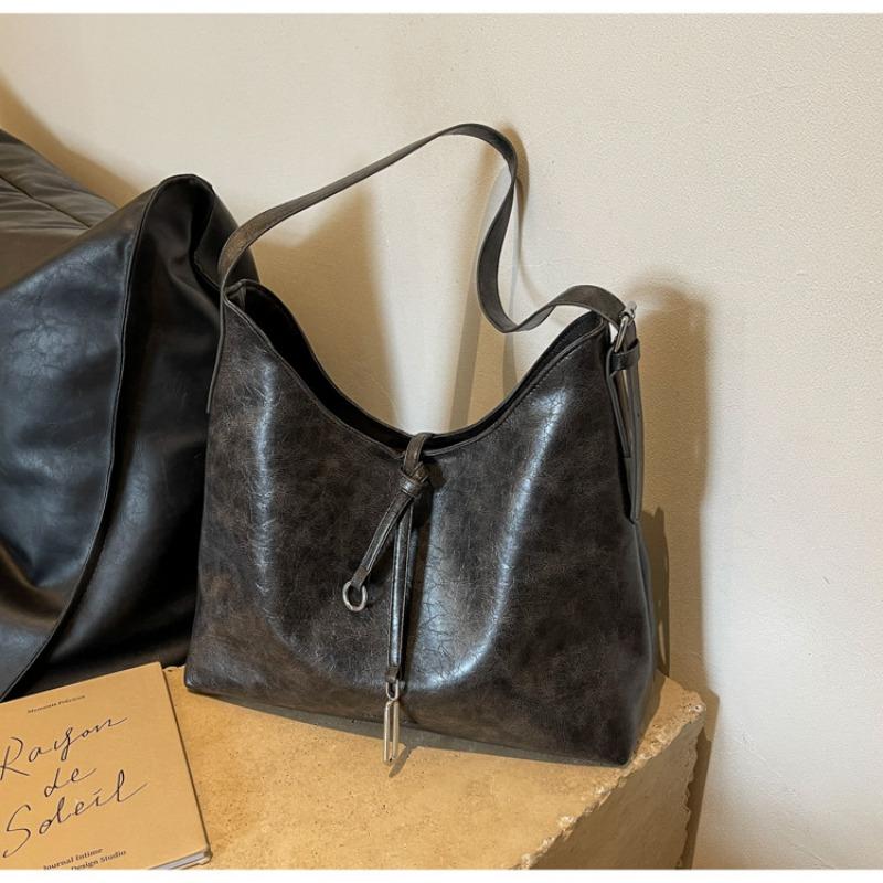 Retro high-end sense fashion large-capacity bag women's new versatile wasteland wind tote bag shoulder bag