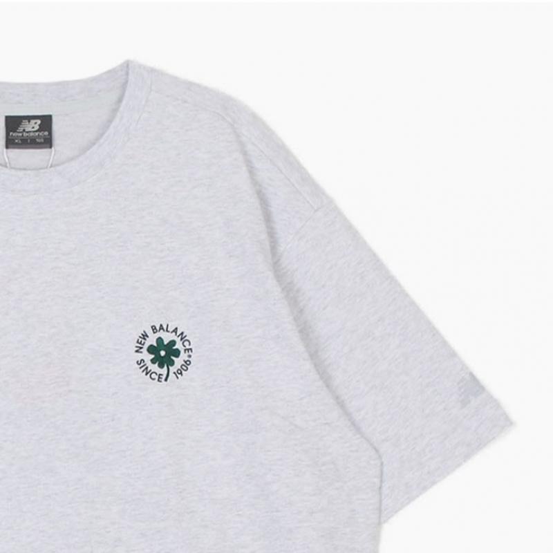 New Balance Tee Nqj Nbnefco233 16 Uni Essential Flower Short Sleeve Tee  Semi