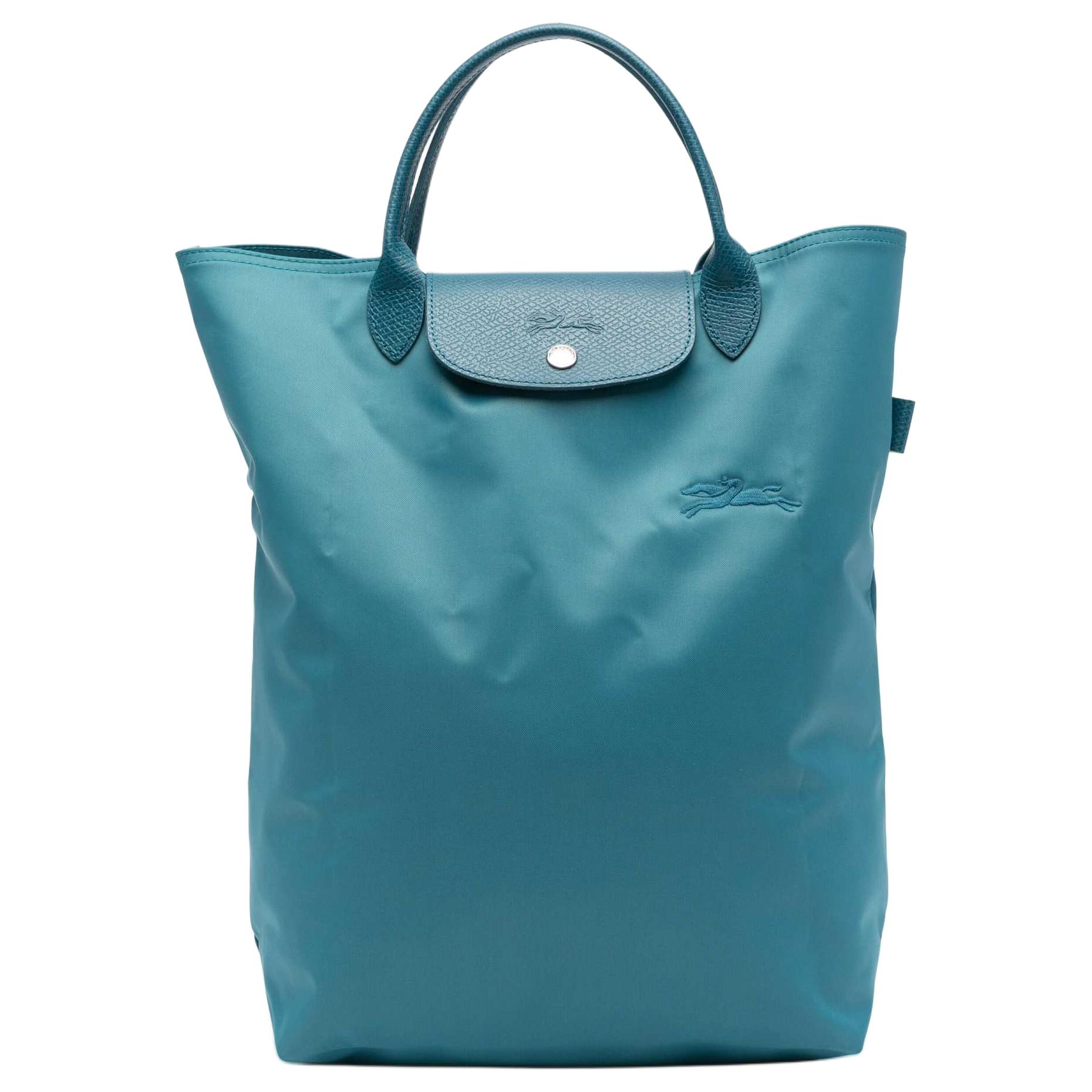 

Longchamp Le Pliage Logo Snap Closure Leather And Recycled Polyamide Canvas Tote Bag Medium Unisex tote bag Peacock-Blue 10168919P89 Basic Set (Bag)
