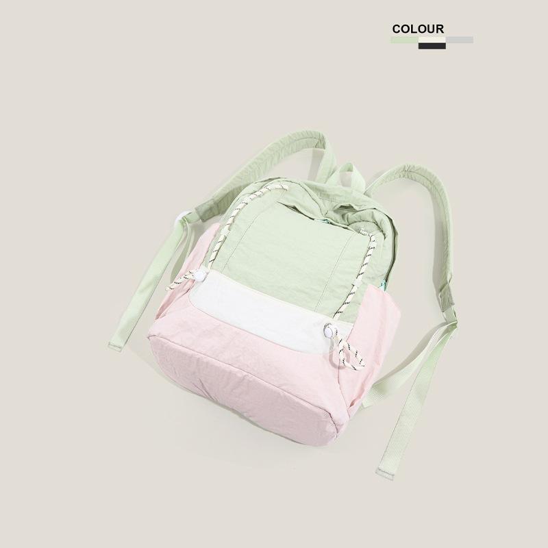 Korean ins contrasting color splicing backpack women's lightweight and versatile junior high school student high school student schoolbag large-capac