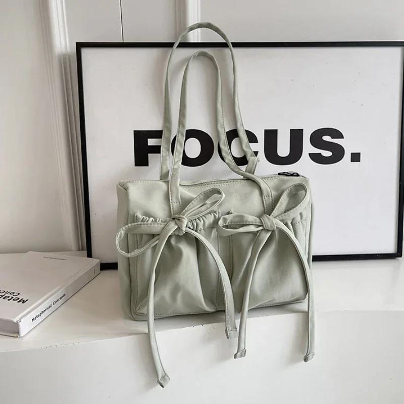 2025 New Korean Bow Nylon Shoulder Bag Folded Large Capacity Commuter Women's Handbag Fashionable and Sweet Design Tote Bag