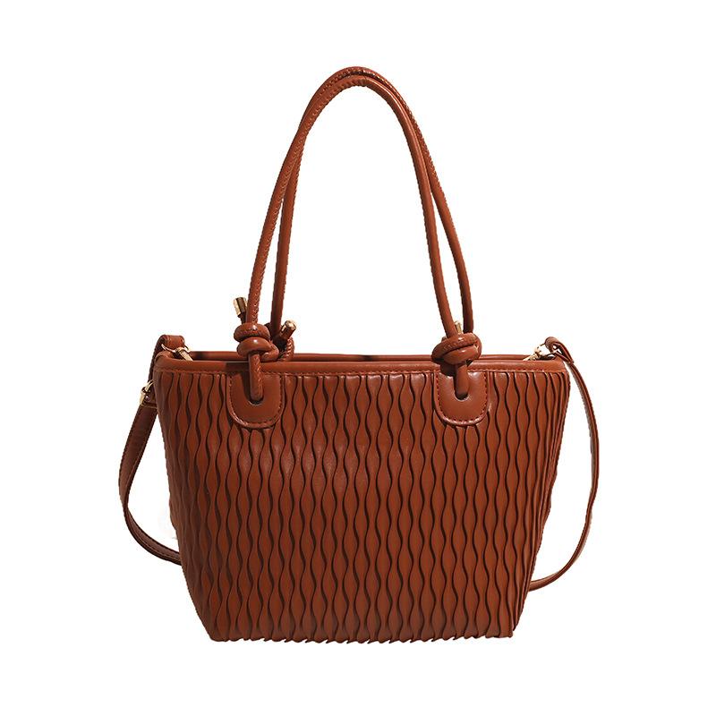 Korean version of trendy fashion bucket bag women's 2025 summer new simple casual shoulder bag high-end oblique span women's bag