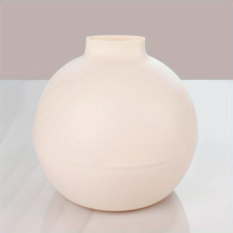 A Round Plastic Tissue Box Tissue DispenserSuitable for KitchensLiving Room and OfficesFeaturing A Nordic Style Tissue Holder