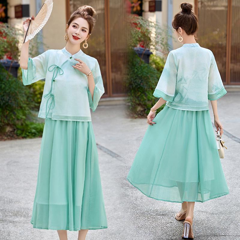 

Летний женский костюм-двойка 2025: Топ с рукавами-колокольчиками в китайском стиле и юбка с принтом L (105-115 jin) мятный зеленый