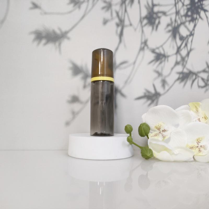 Available 60ml Transparent Black Foam Mousse Bottle for Face Wash and Travel-friendly Cosmetic Packaging.