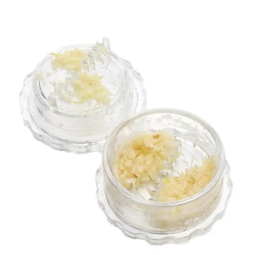 

The kitchen grinder and garlic press box, mini garlic puree machine, garlic press accessories, and garlic mince machine are suit