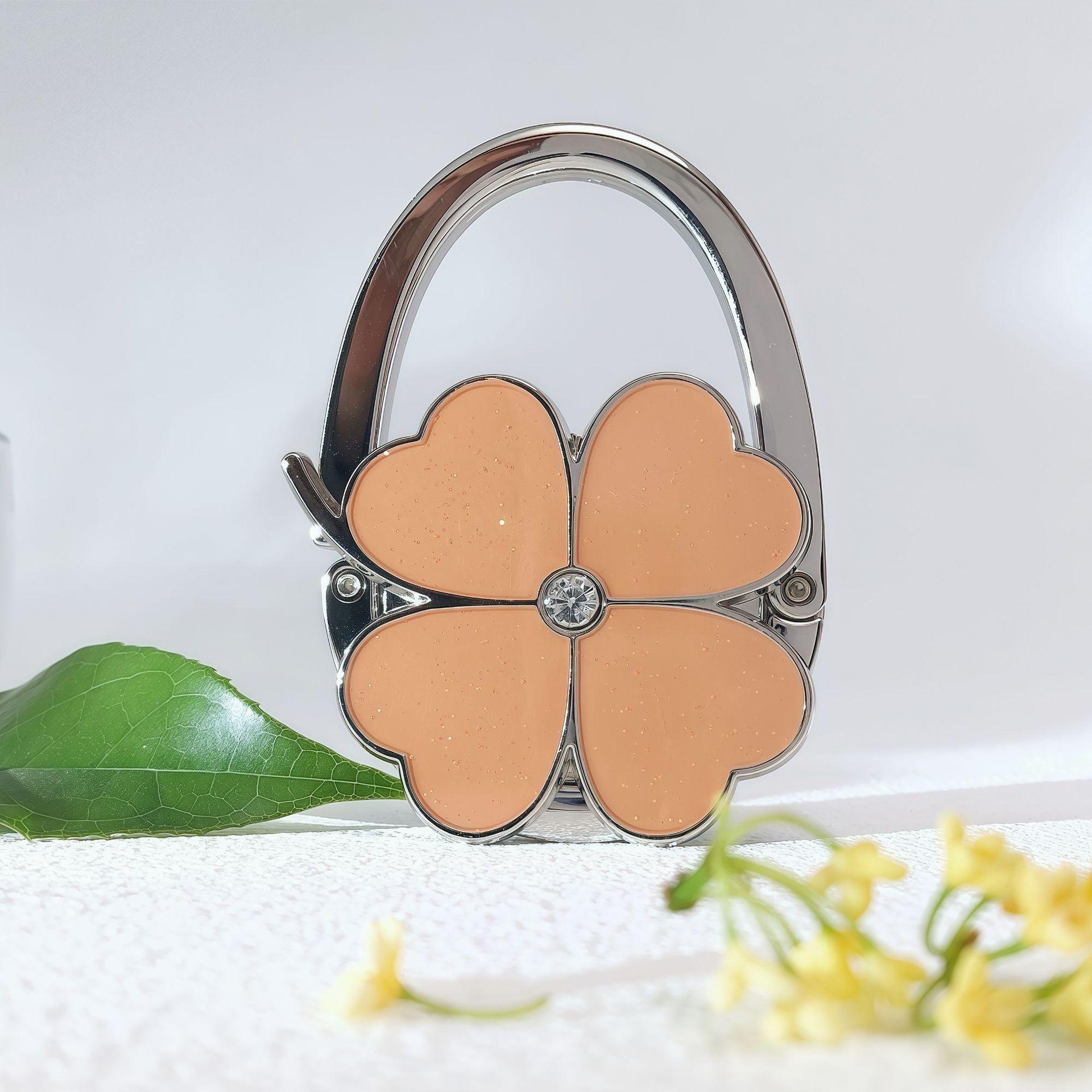 

Портативный металлический держатель для сумки в форме цветка - Складной крючок для сумочки, Крошечные портативные крючки для кошелька, сумки-тоут, органайзера розовый