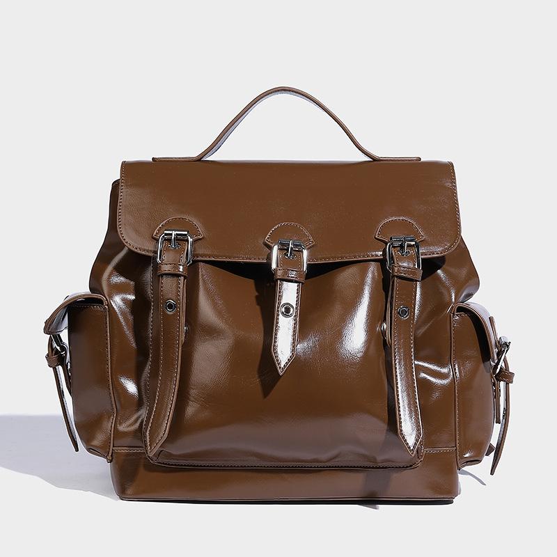 

2024 autumn and winter fashion simple large capacity multi pocket backpack niche design high sense commuter versatile backpack коричневий