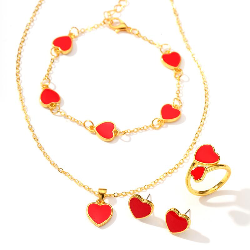 

Набор украшений в форме сердца, модный и романтичный, изысканная асимметричная подвеска в виде сердца любви, набор украшений из четырех предметов.