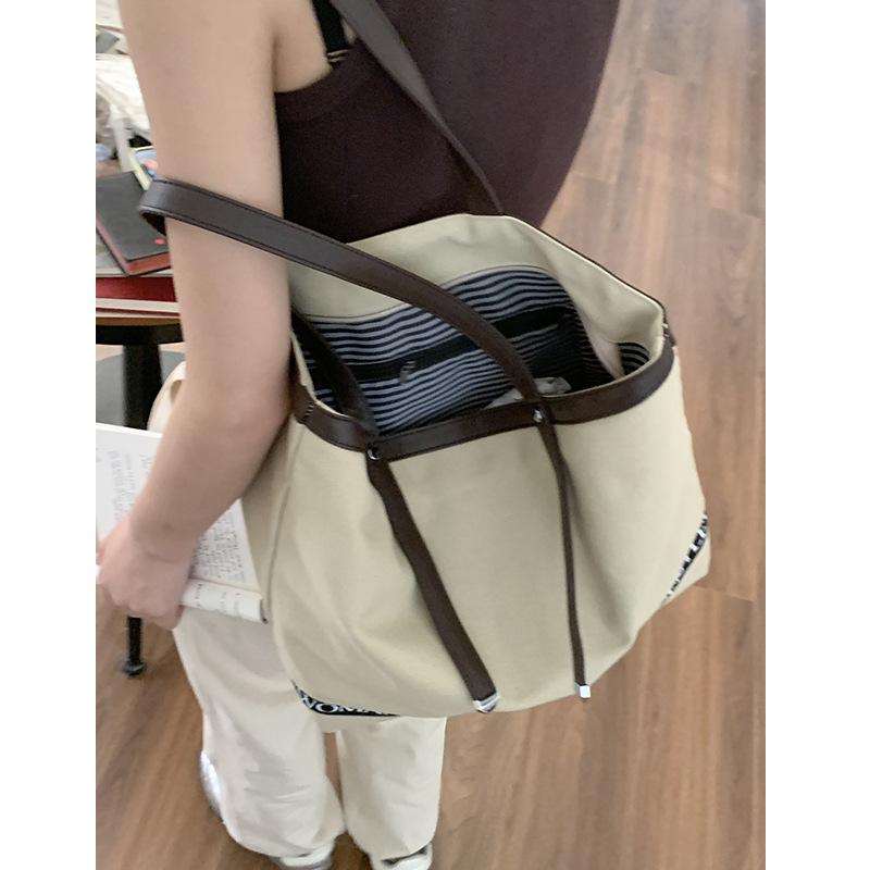

Casual canvas bag niche literary Korean version armpit bag 2025 new simple canvas bag large capacity shoulder bag
