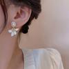 Silver needle white lily stud earrings special design sense flower popular earrings women's niche French style earrings
