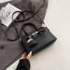 Simple temperament hand bag women's spring new niche fashion messenger bag commuter shoulder bag
