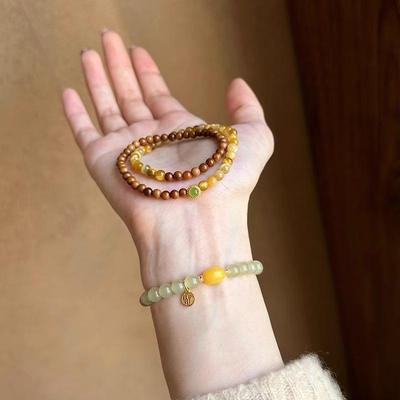 Natuurlijke tijgeroogsteen Kook dubbellaags kralenarmband Guochao armband, niche lichte luxe high-end handjuweel.