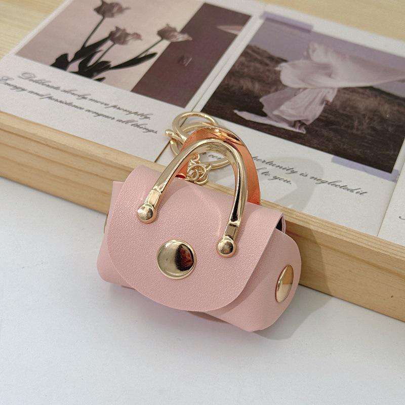Trendy Keychain Pendant: Stylish Earphone Case, Coin Purse, and Mini Bag Accessory
