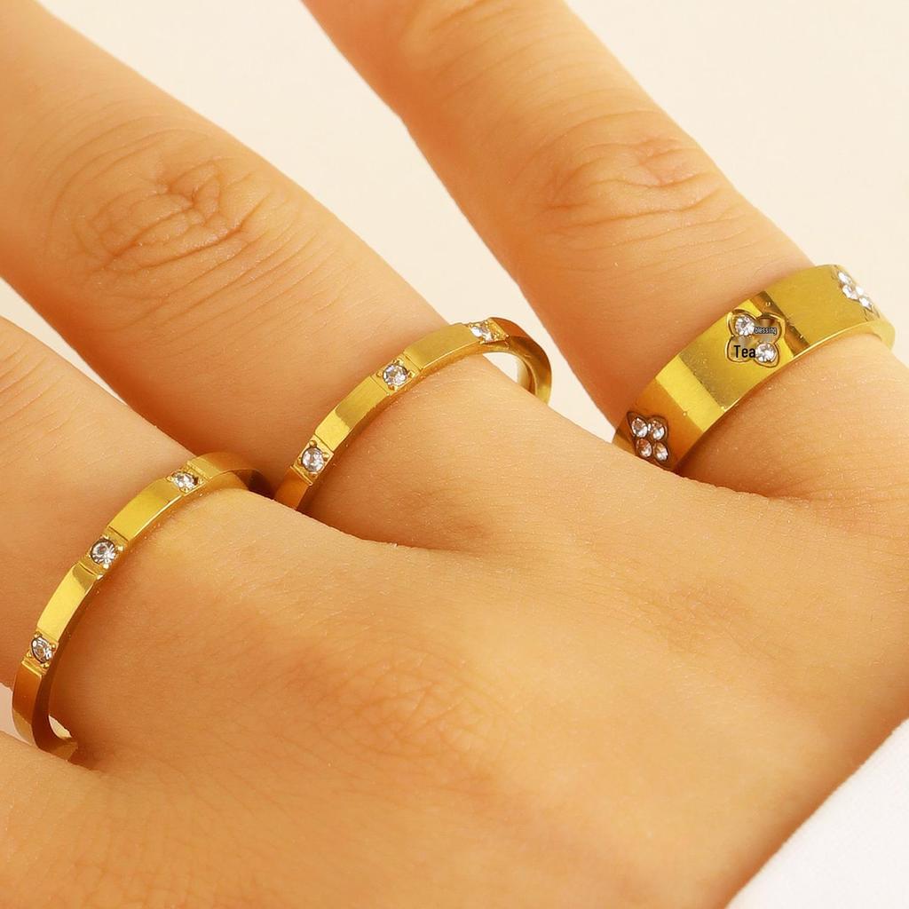 Gold-Plated Diamond-Inlaid Stainless Steel Cross Ring Set: Three-Piece Light Luxury Design with Single Row Stackable Flower Rings.