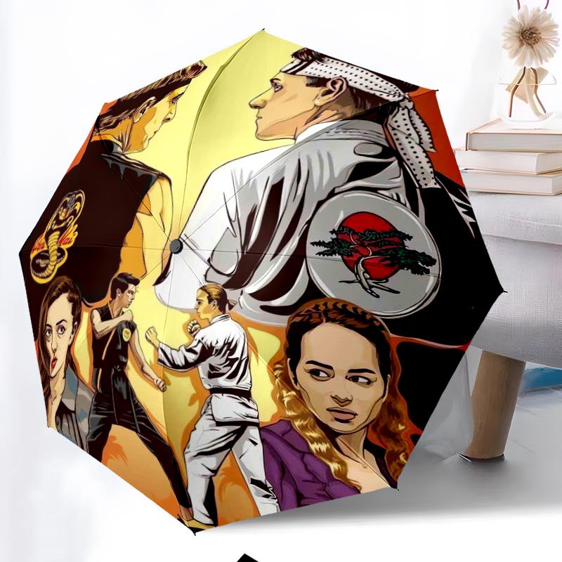 Cobra Kai Fashionable Automatic Opening/Closing Folding Umbrella. Portable and Foldable, Ideal for Gift, Travel, and Daily Use.